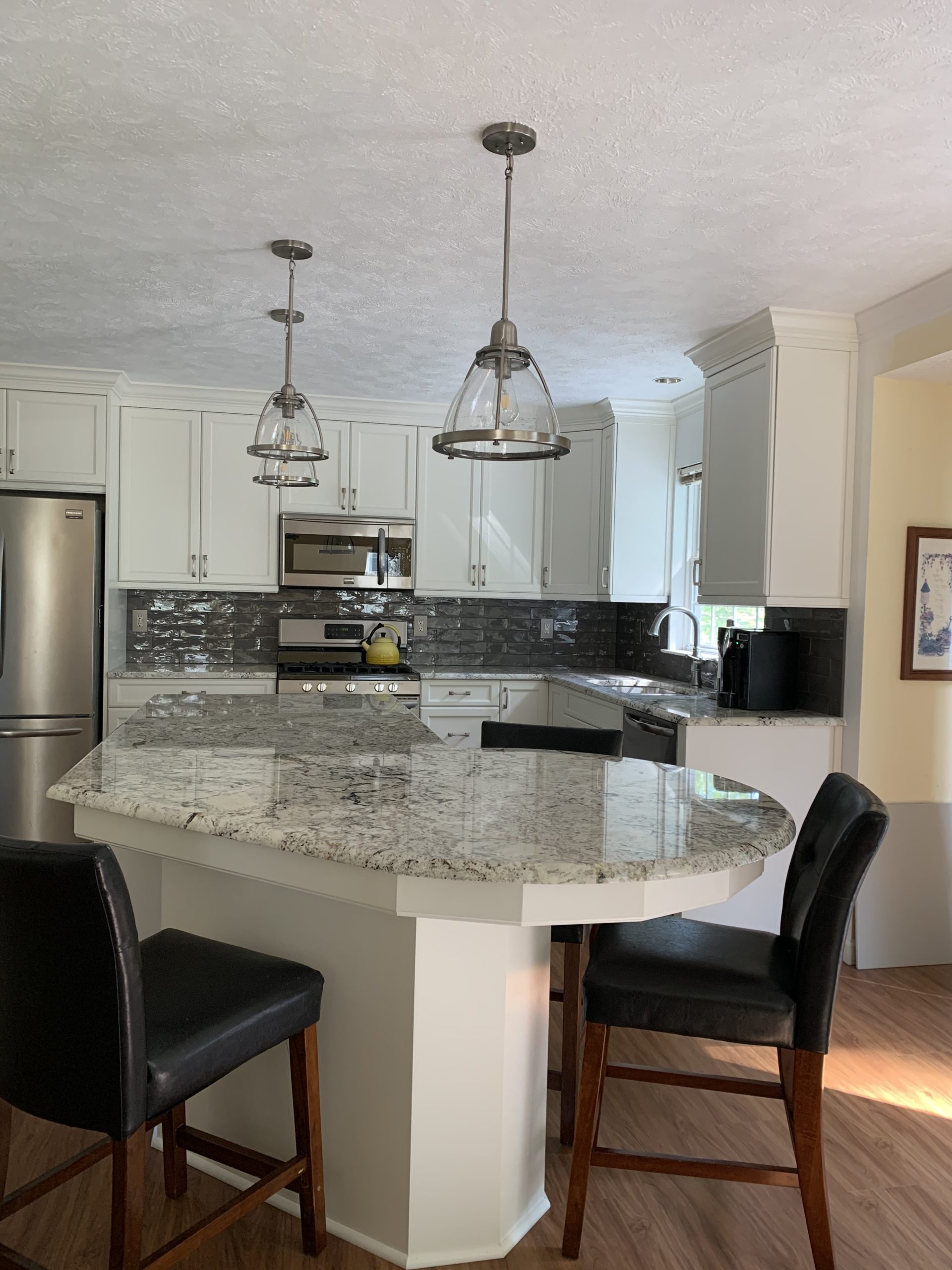  |  White Kitchen Marble Island and Light Fixtures