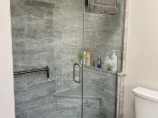 Classic bathroom, grey and white marble shower, small white shower floor tiles