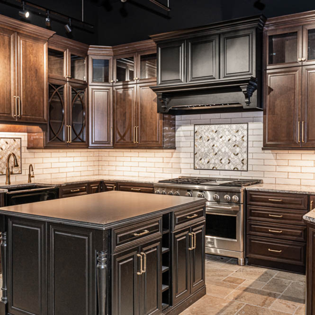 Traditional kitchen remodel, ancient-like dark island, traditional brown cabinets, marble counter, black vent hood