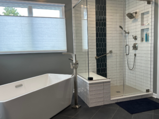 Contemporary spacious bathroom remodel, big tub and shower, modern grey floor tile