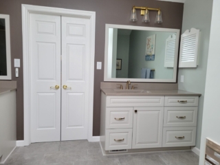 Elegant bathroom inspiration, brown accent wall bathroom, sophisticated vanity idea, neutral color palette
