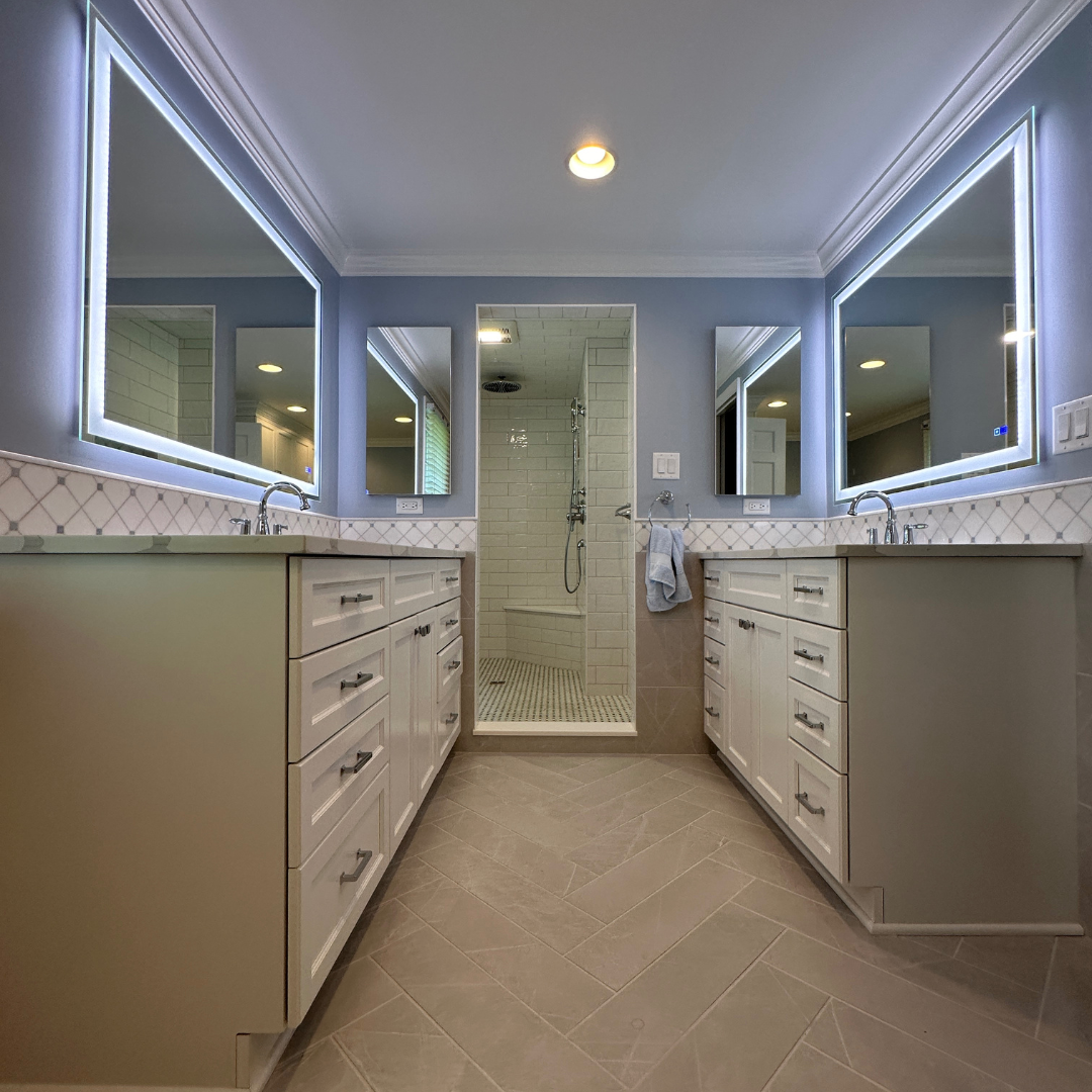 Classic bathroom remodel with a shower, two separate sinks and storage, modern brown floor