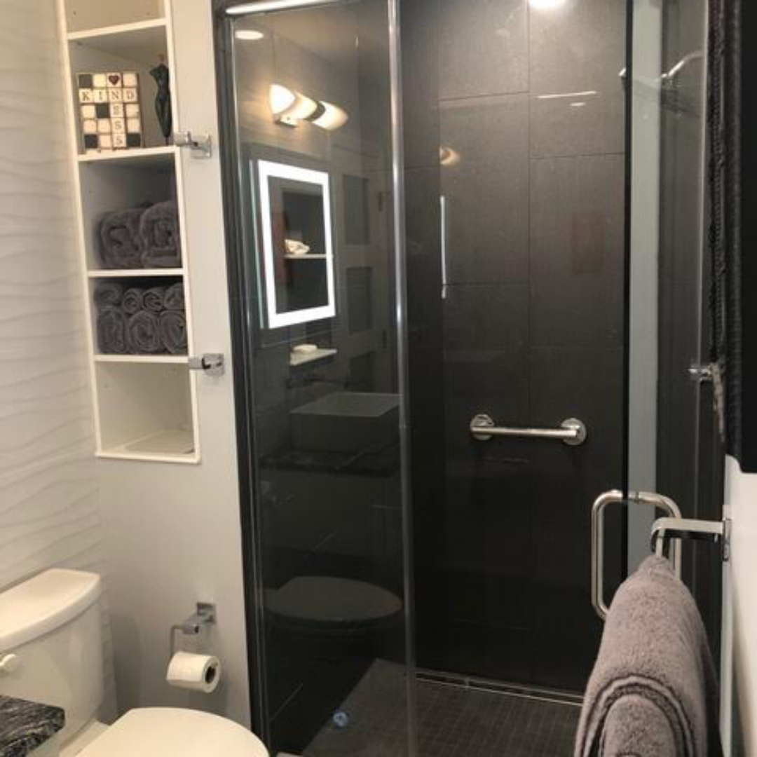 Contemporary bathroom, black tiles, shelves, toilet