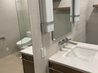 Floating wood vanity, minimalist modern sink, wall-mounted bathroom faucet, contemporary bathroom, neutral tiles