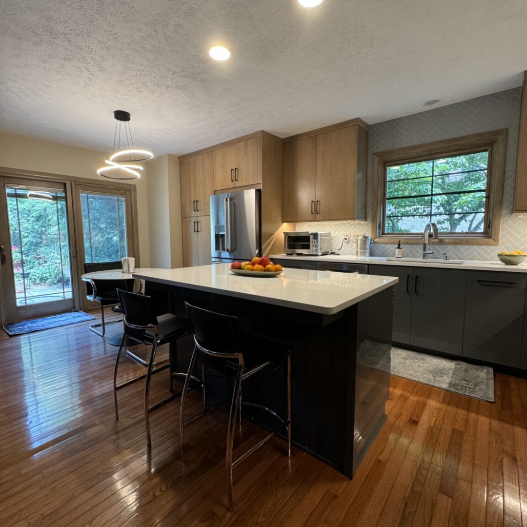 Modern kitchen idea, two-tone cabinet, sleek island inspiration, warm hardwood floor