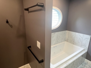 Modern bathroom idea, herringbone floor inspiration, spa tub design, bathroom design idea
