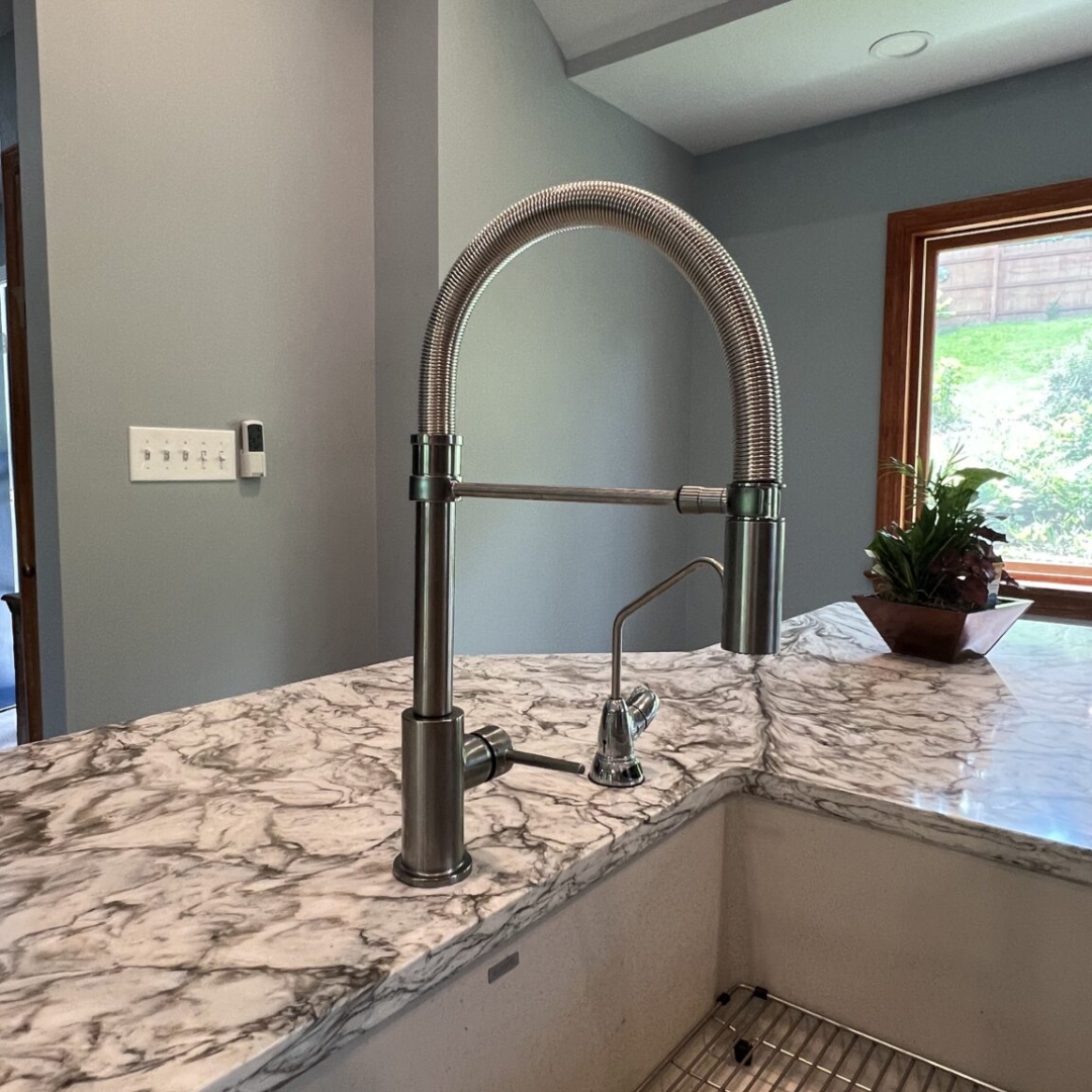 High-arch kitchen faucet idea, farmhouse sink inspiration, modern fixtures, countertop texture