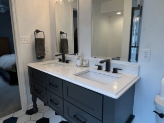 Black vanity design, double sink idea, industrial lighting style, hexagon floor tiles, elegant sink inspiration