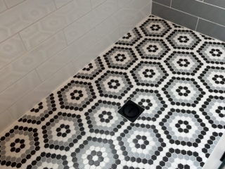 Geometric flower tile patter, hexagon mosaic floor, modern tile idea, shower tile inspiration